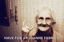 an elderly woman giving a middle finger with the words have fun at joanne fabrics below her