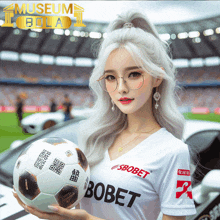 a woman holding a soccer ball with the word bobet on it