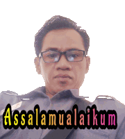 a man wearing glasses and a shirt that says assalamualaikum on it