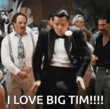 a man in a tuxedo is dancing with the words i love big tim written below him