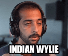 a man wearing headphones says indian wylie