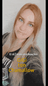 a woman with long blonde hair is wearing a black shirt with the name gigi on it