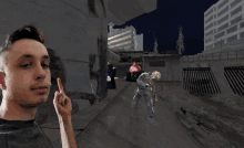 a man giving the middle finger is standing in front of a video game scene