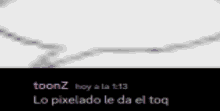 a blurry picture of a necklace with the words toonz lo pixelado le da el toq