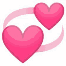 two pink hearts are connected to each other with a pink ribbon .