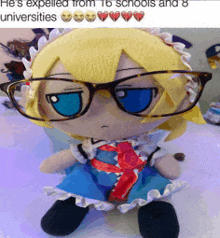 a stuffed doll is wearing glasses and a maid outfit