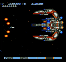 a video game screen shows a space ship with a speedup and vertical bar