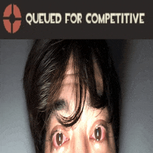 a close up of a person 's face with the words queued for competitive behind him