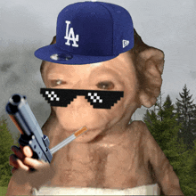 a monkey wearing a la hat holds a gun