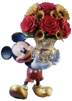 a statue of mickey mouse holding a vase of red roses and sunflowers