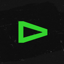 a green triangle on a black background that looks like a play button