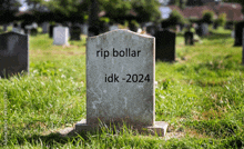 a gravestone in a cemetery with the words rip bollar idk 2024 written on it