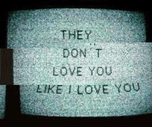 a tv screen with the words `` they don t love you like i love you '' on it .