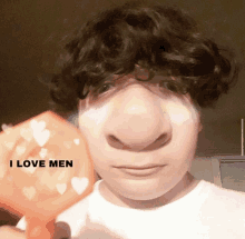 a man with a big nose and hearts on his face says " i love men " on the bottom