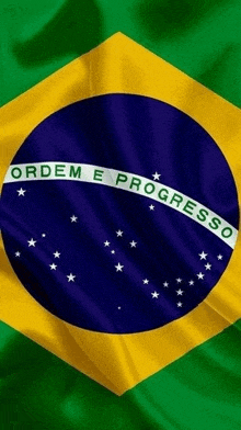 a close up of the brazilian flag with the words ordem e progresso