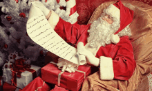 santa claus is reading a letter from a child