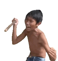 a boy without a shirt is holding a stick in his right hand