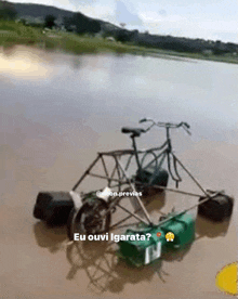 a bicycle is floating in a body of water with the caption eu ouvi igarata