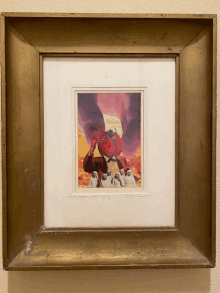 a framed painting of a man in a red hat with the words " the beginning of the end "