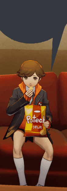 a boy sitting on a couch holding a bag of potech chips