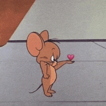 jerry from tom and jerry is holding a pink heart