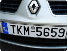 a renault car with a license plate that says tkm 5659