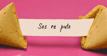 a fortune cookie with the words sos re puto on it