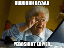 an elderly woman is looking at a laptop screen with a caption that says yeboshiiit ediyer