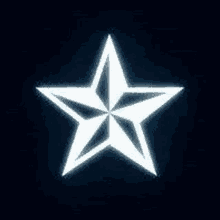 a white star on a black background with a glowing effect .