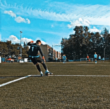 a soccer player wearing a number 7 jersey is kicking the ball