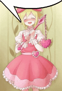 a girl in a pink dress is holding a heart shaped wand