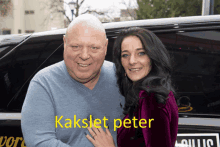 a man and a woman are posing for a picture and the man 's name is kakselt peter