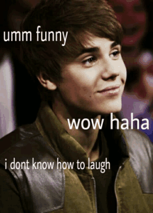 a picture of justin bieber with a caption that says " umm funny wow haha i dont know how to laugh "