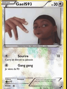 a pokemon card with a picture of a woman and a hand pointing at her face .