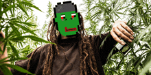 a man with dreadlocks and a pixelated face is holding a bottle of weed