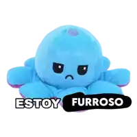 a blue stuffed octopus with a black sticker that says " estoy furroso "