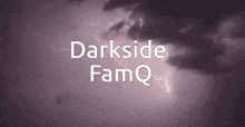 a dark cloudy sky with lightning and the words darkside famq written in white