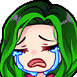 a cartoon girl with green hair is crying and has tears running down her face .