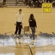 a man and a woman are standing in a circle on a basketball court with the year 1968 on the bottom