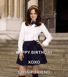 a woman in a school uniform is standing on a set of stairs and says happy birthday xoxo gossip friend .