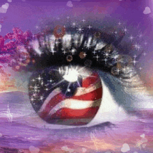 a close up of a woman 's eye with an american flag on it