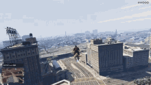 a man is flying over a city in a video game called grand theft auto