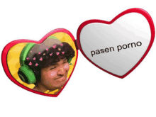 a heart shaped mirror with a picture of a woman and the words pasen porno on it