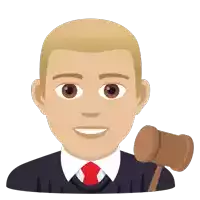 a man in a suit and tie is smiling and holding a wooden gavel