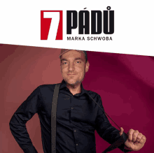 a man in a black shirt and suspenders is standing in front of a 7 padu logo