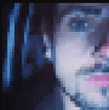 a pixelated image of a woman 's face with a blue background