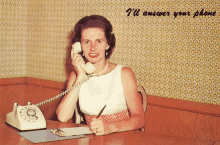 a woman sitting at a desk talking on a phone with the words " i 'll answer your phone " on the bottom right