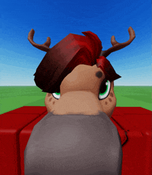 a cartoon character with red hair and antlers is sitting on a red block