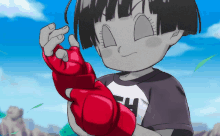 a cartoon character with the letter h on her shirt holds a red object