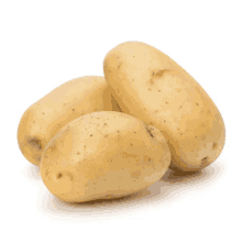 three potatoes are stacked on top of each other